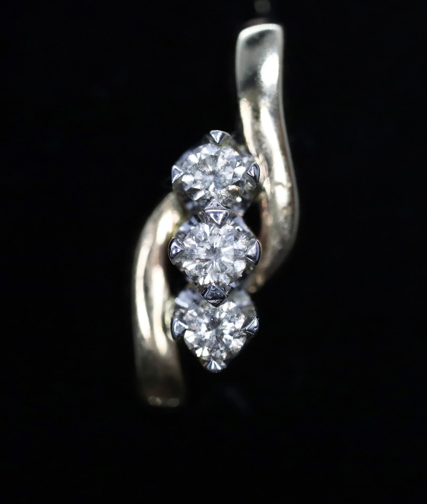 14k Diamond Earrings. 3 stone DIAMOND bypass drop earrings