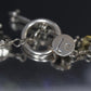 Laura Gibson Bracelet. Sterling Silver with Dangling Faceted Gems -Pink Tourmaline, Smokey Quartz, and Whiskey Quartz (289)