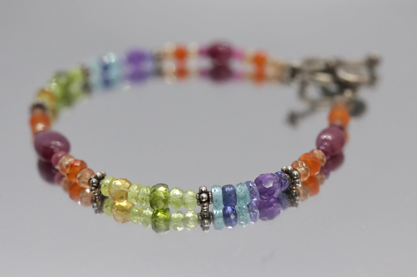 Laura Gibson Bracelet. Sterling Silver with Dangling Faceted Gems - Carnelian Amethyst Tourmaline (299)