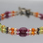 Laura Gibson Bracelet. Sterling Silver with Dangling Faceted Gems - Carnelian Amethyst Tourmaline (299)