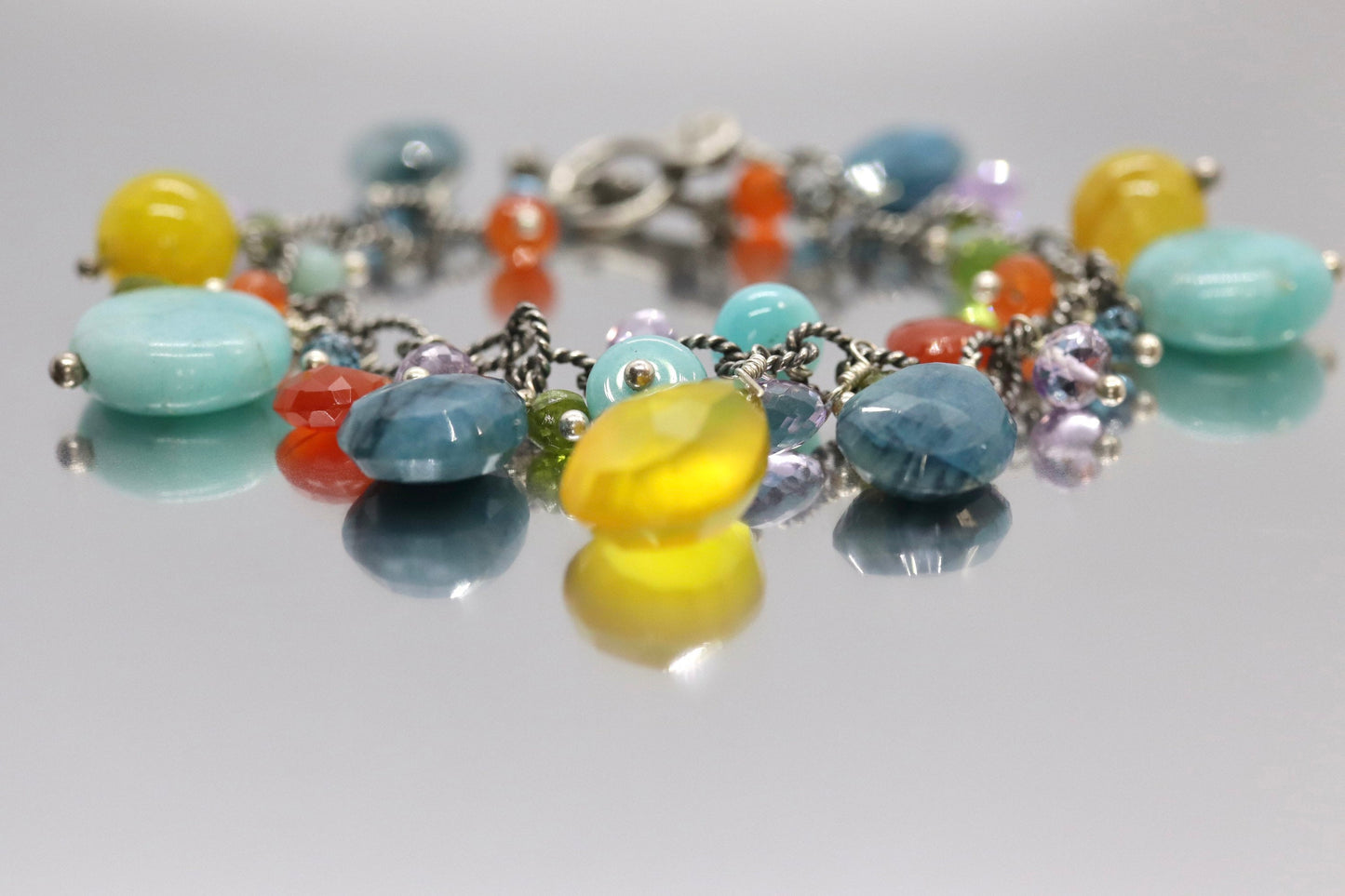 Laura Gibson Bracelet. Sterling Silver with Dangling Faceted Gems - Amazonite Amethyst(435)