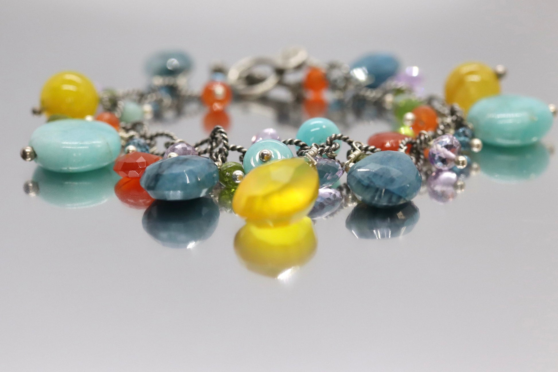 Laura Gibson Bracelet. Sterling Silver with Dangling Faceted Gems - Amazonite Amethyst(435)