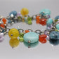 Laura Gibson Bracelet. Sterling Silver with Dangling Faceted Gems - Amazonite Amethyst(435)