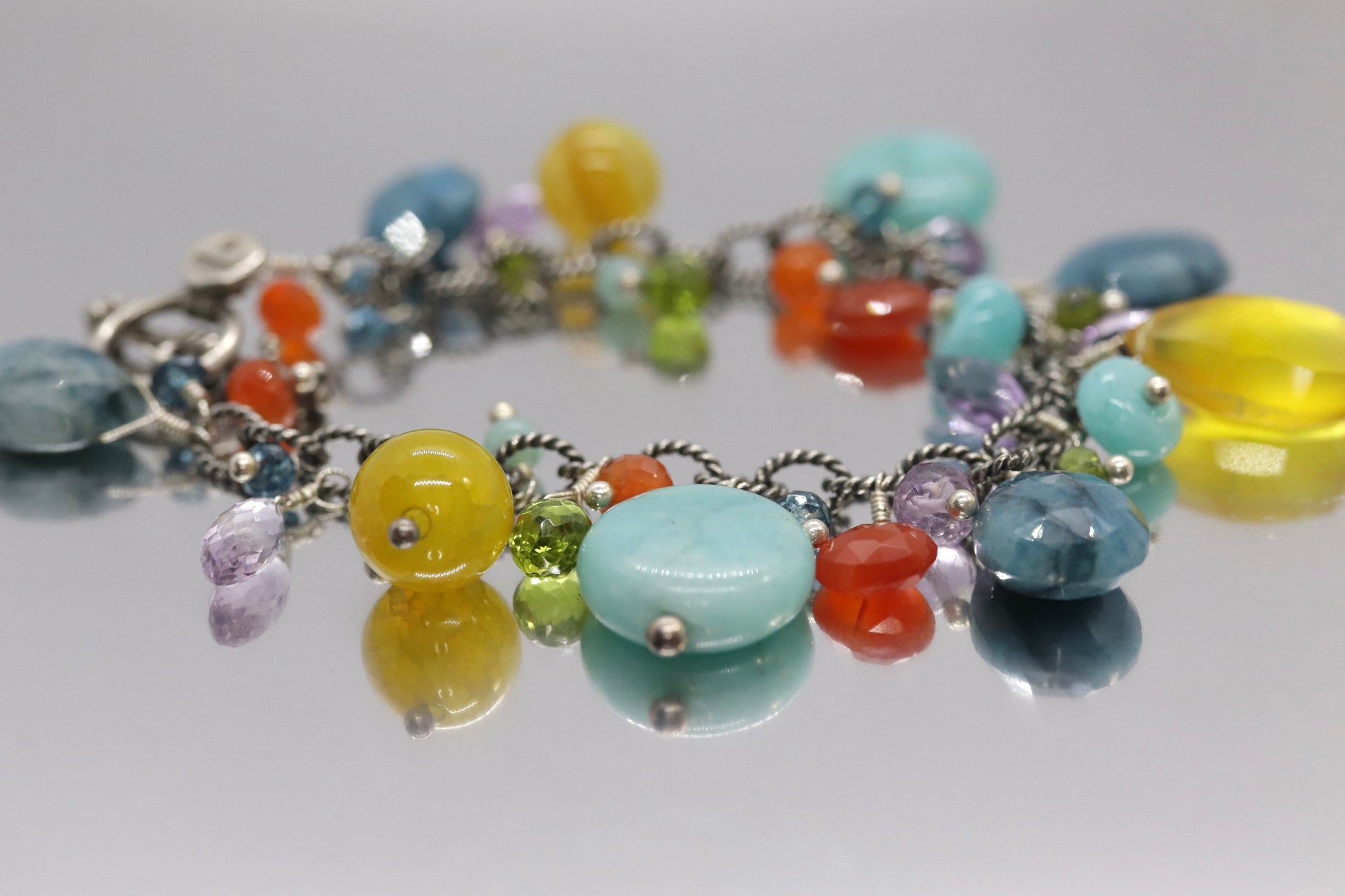 Laura Gibson Bracelet. Sterling Silver with Dangling Faceted Gems - Amazonite Amethyst(435)