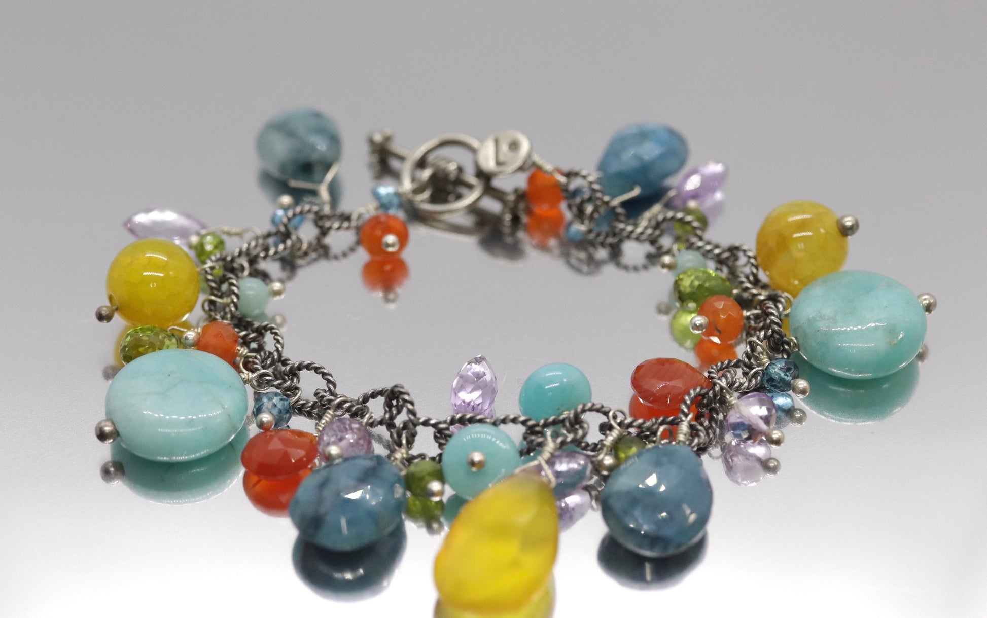 Laura Gibson Bracelet. Sterling Silver with Dangling Faceted Gems - Amazonite Amethyst(435)