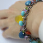 Laura Gibson Bracelet. Sterling Silver with Dangling Faceted Gems - Amazonite Amethyst(435)