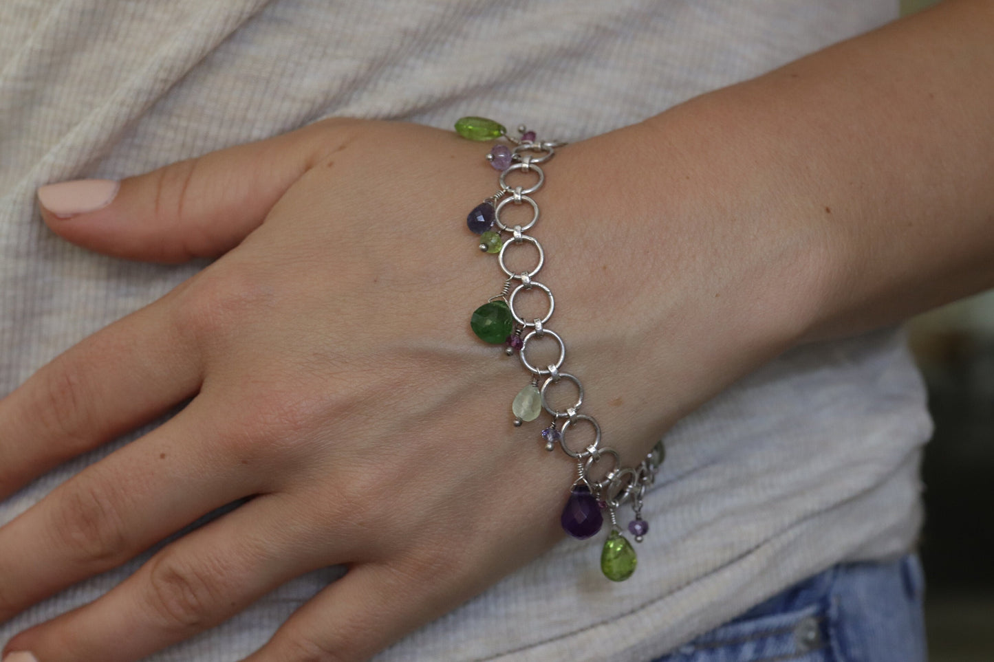 Laura Gibson Bracelet. Sterling Silver with Dangling Faceted Gems - Amethyst (464)