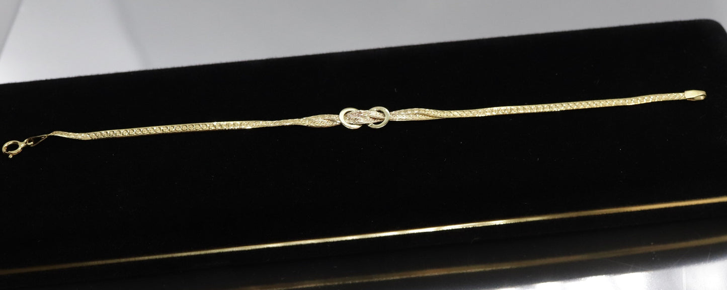 Twisted herringbone bracelet. 14k Reversible high polish bracelet
