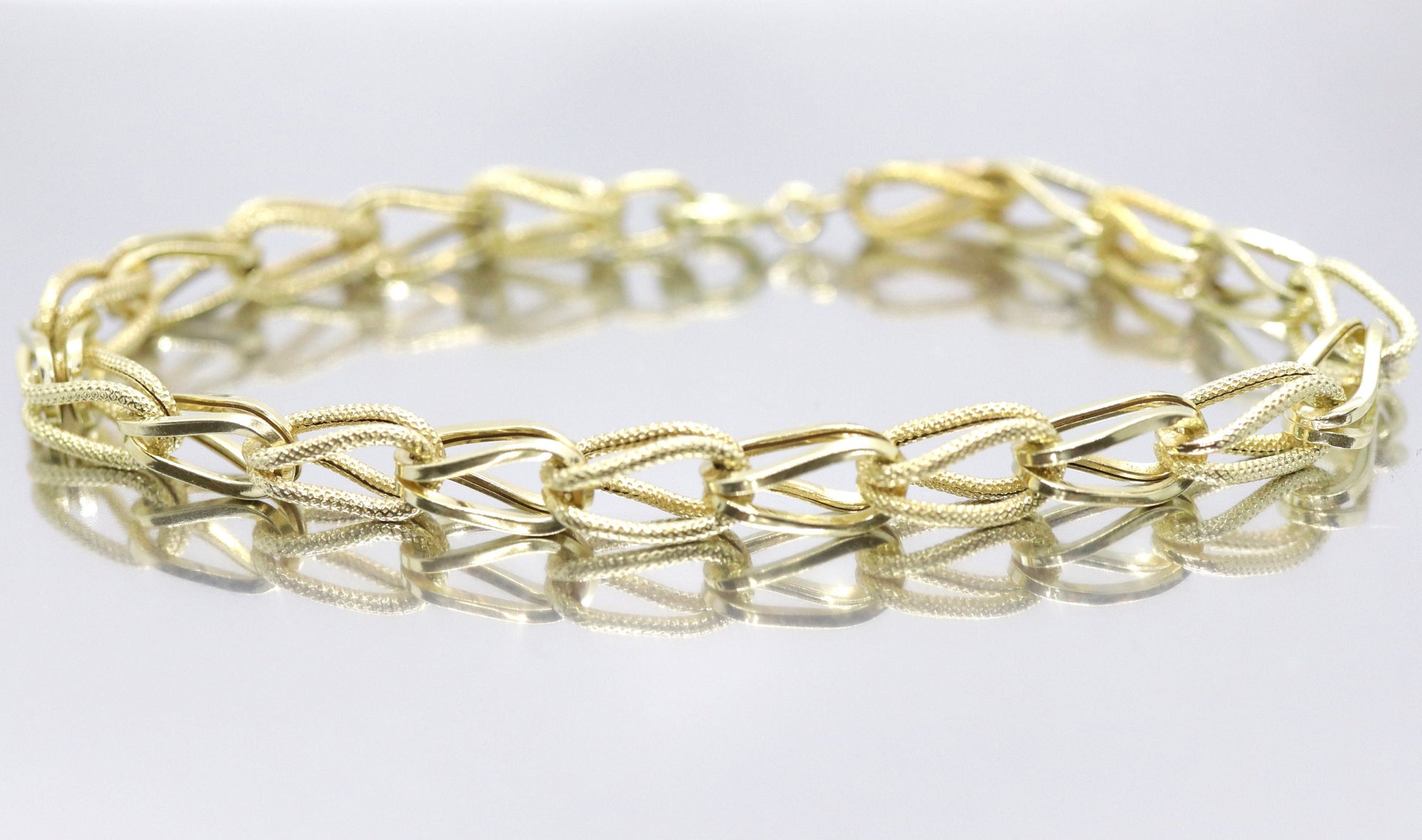 14k UNOAeRRE Textured Link Chain BRACELET. 14k LOOP Italian Bracelet 6.9g 8in length