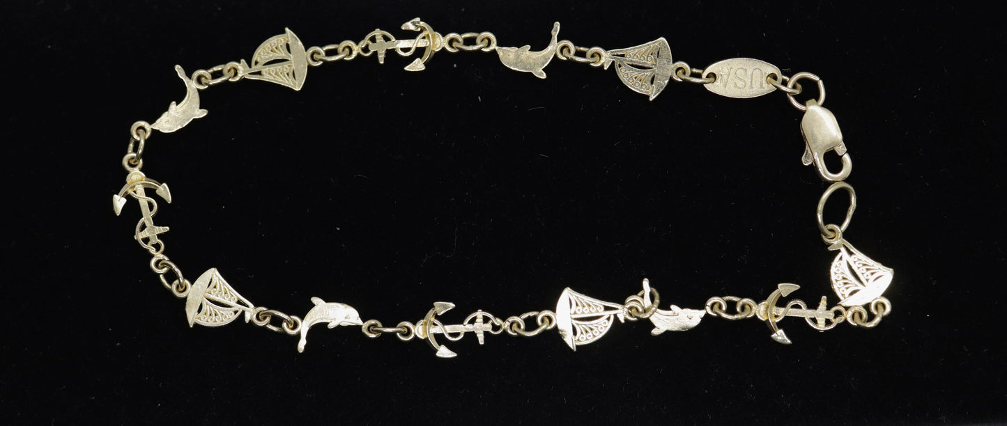 14k Sea Dolphin Sailboat Anchor Charm bracelet. Nautical Bracelet. Marine Bracelet. Michael Anthony MA bracelet