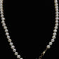 10k Freshwater Pearl Necklace. 18in length 6mm oval pearls
