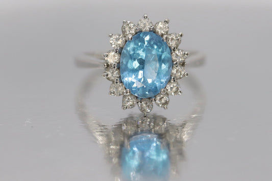 14k Aquamarine Topaz and CZ Halo ring. 14k Aquamarine Halo solitaire.