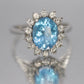 14k Aquamarine Topaz and CZ Halo ring. 14k Aquamarine Halo solitaire.