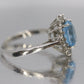 14k Aquamarine Topaz and CZ Halo ring. 14k Aquamarine Halo solitaire.