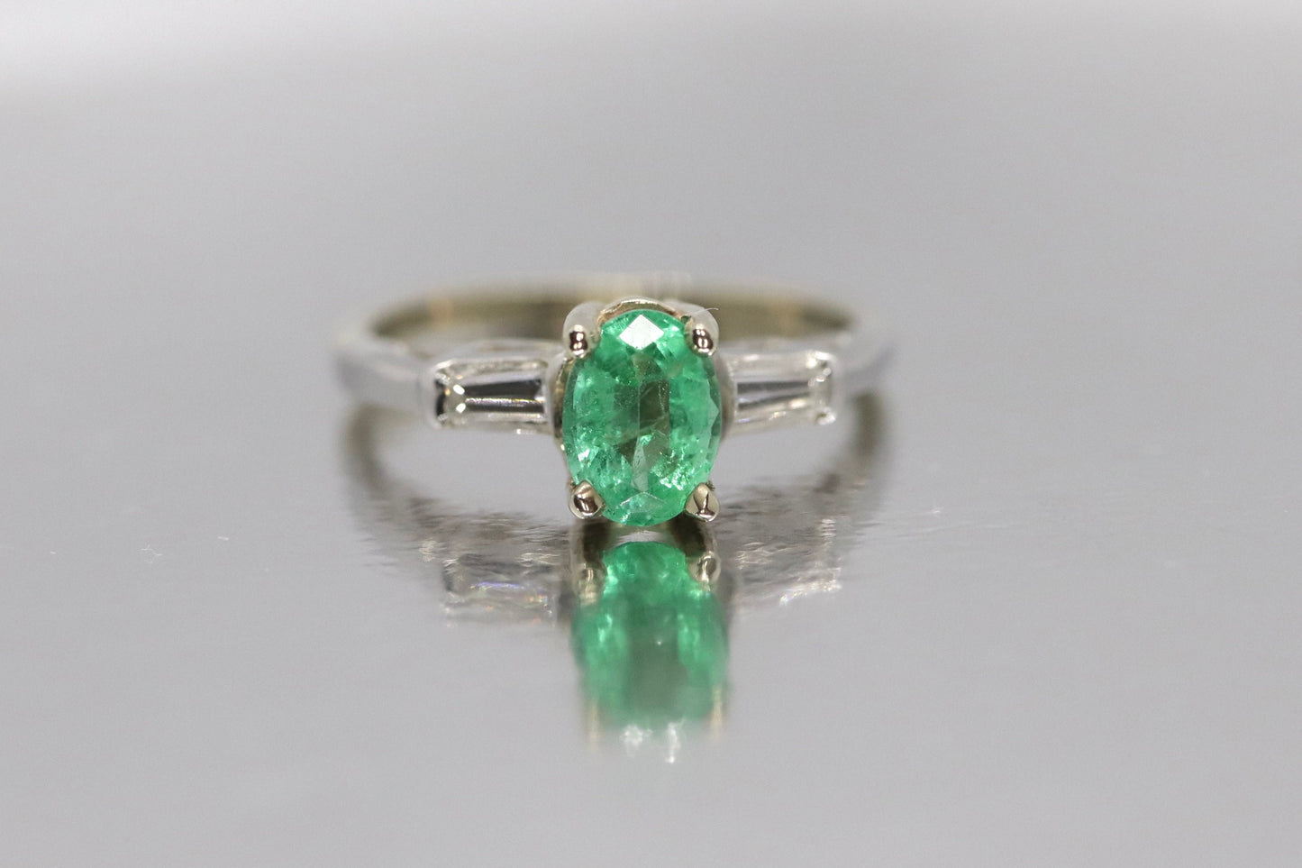 14k Oval Emerald and Baguette diamond ring. 14k white gold Green Emerald solitaire.