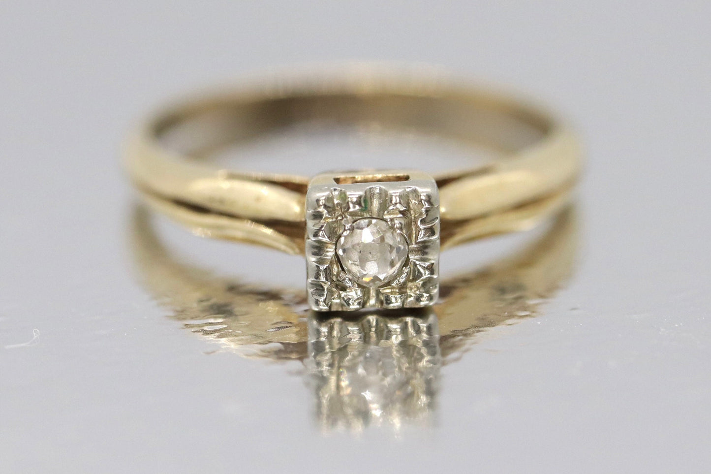 Art Deco Diamond ring. 14k Yellow and White Gold Square table.