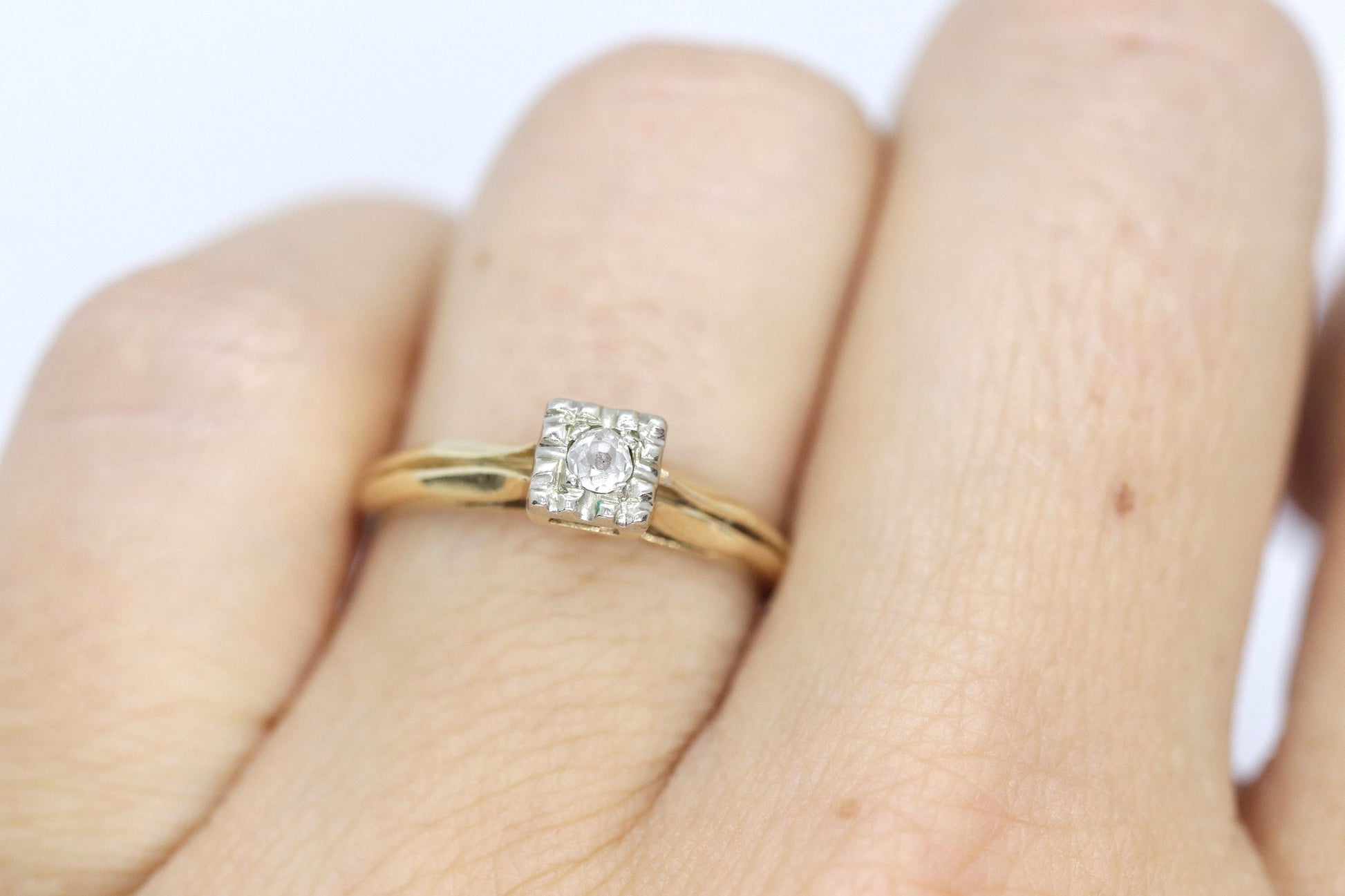 Art Deco Diamond ring. 14k Yellow and White Gold Square table.