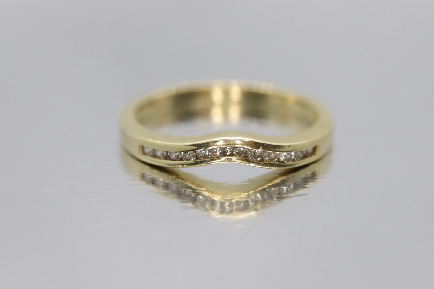 14k Diamond Eternity ring. Channel set Diamond V band