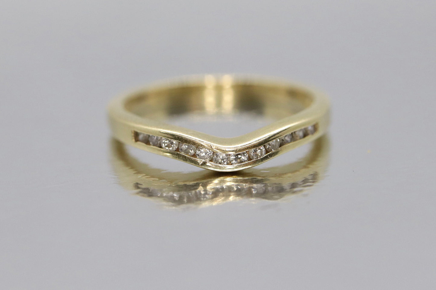 14k Diamond Eternity ring. Channel set Diamond V band