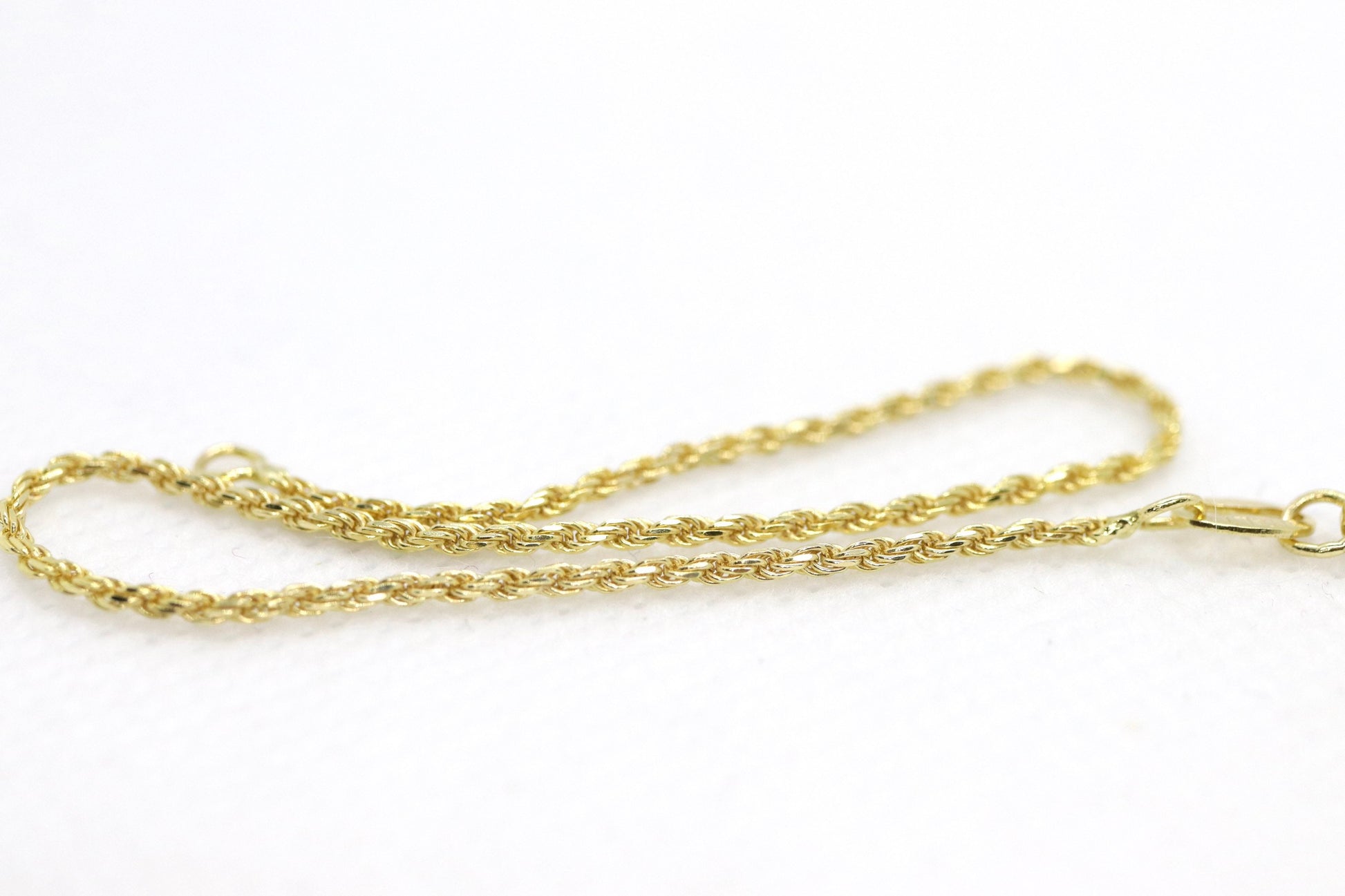 14k Gold Twisted Rope Bracelet 1.5mm 1.7 grams. Gold braided rope bracelet