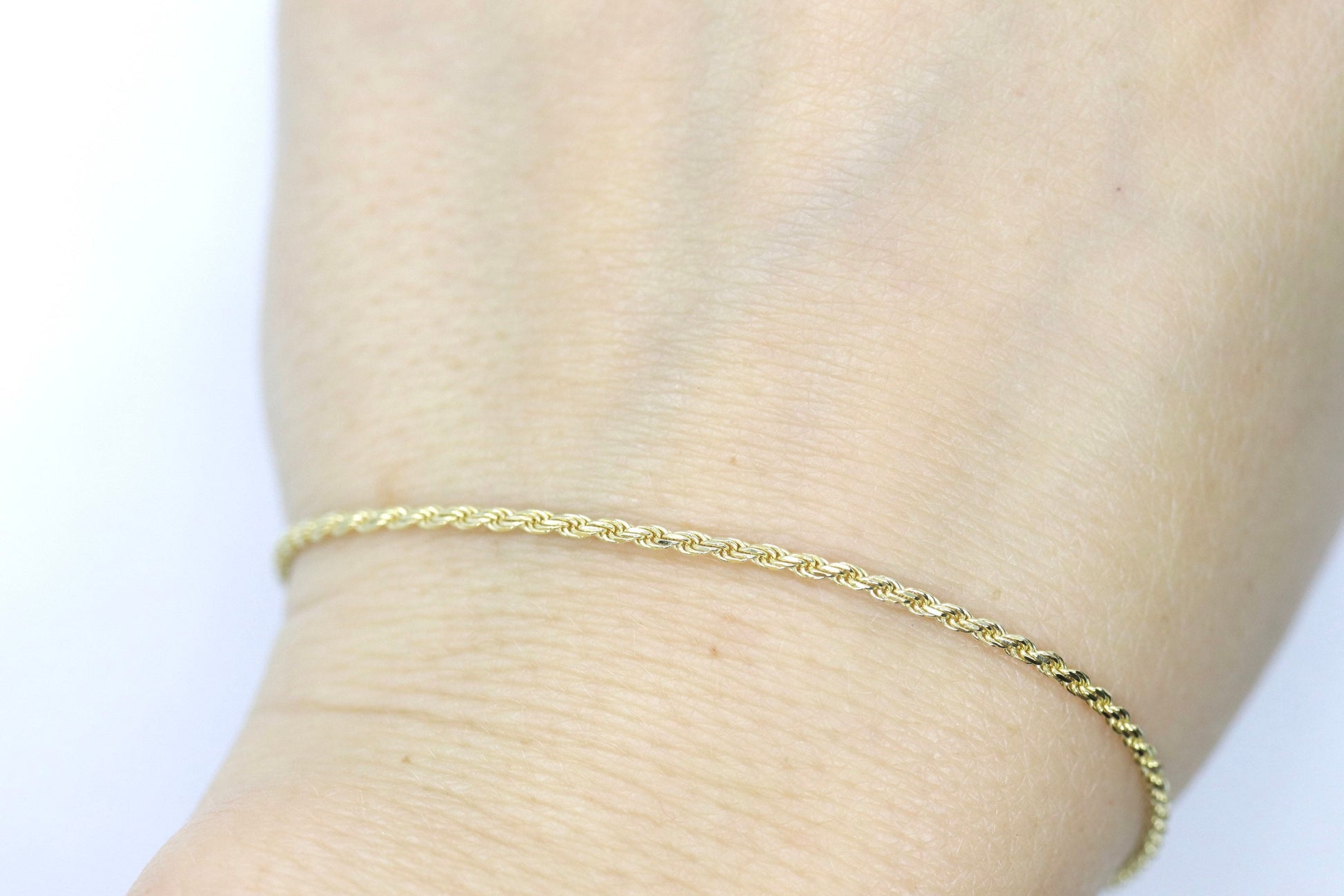 14k Gold Twisted Rope Bracelet 1.5mm 1.7 grams. Gold braided rope bracelet