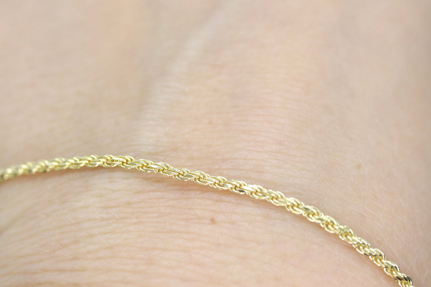 14k Gold Twisted Rope Bracelet 1.5mm 1.7 grams. Gold braided rope bracelet