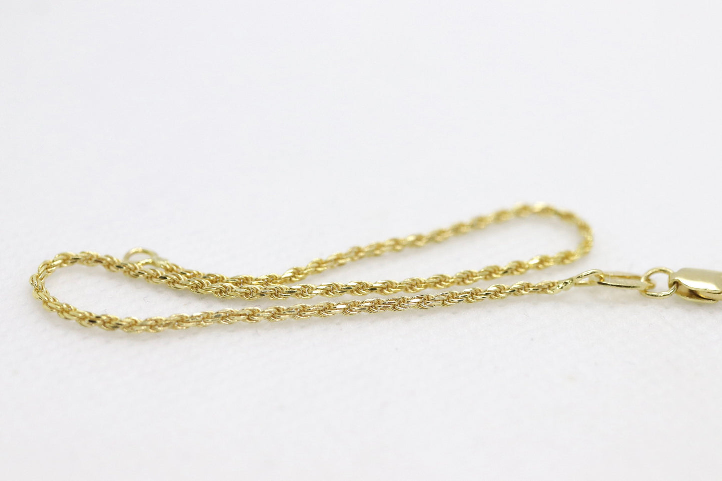 14k Gold Twisted Rope Bracelet 1.5mm 1.7 grams. Gold braided rope bracelet