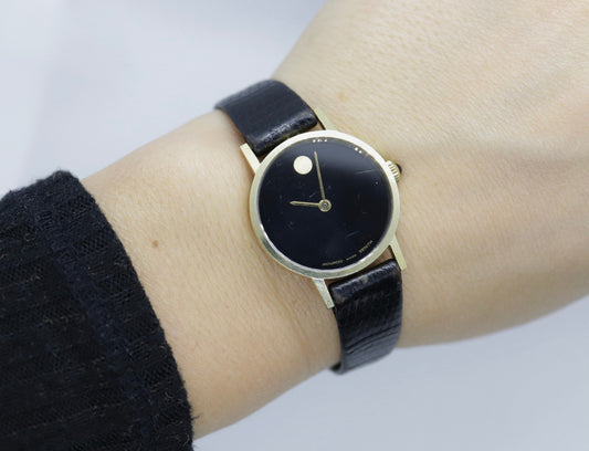 14k MOVADO Zenith Round Mechanical Watch. Movado Vintage Ladies watch with black leather band st(124/85)