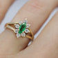14k Marquise Emerald and Diamond Halo yellow gold ring. 0.36ctw in diamonds