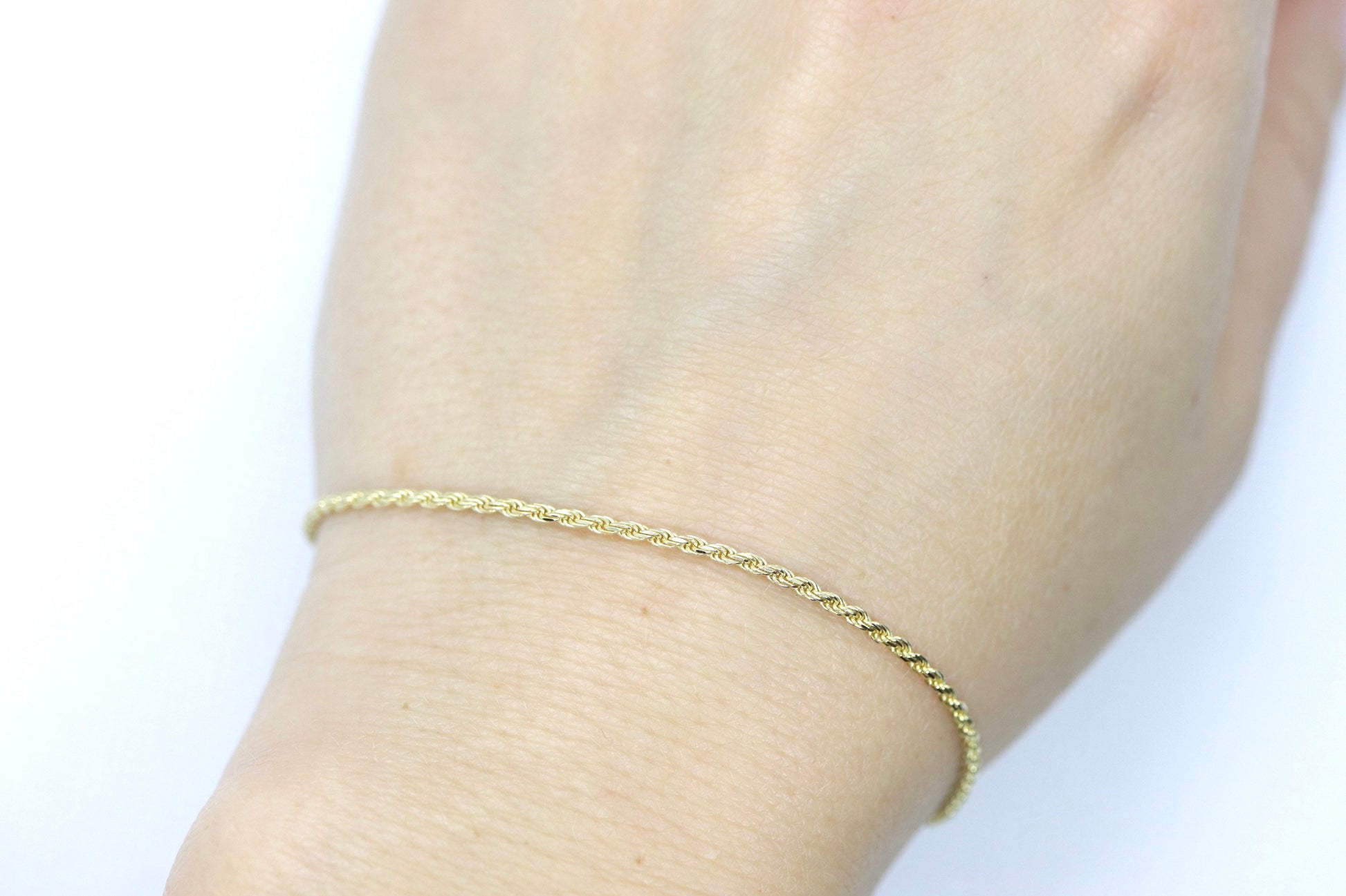 14k Gold Twisted Rope Bracelet 1.5mm 1.7 grams. Gold braided rope bracelet