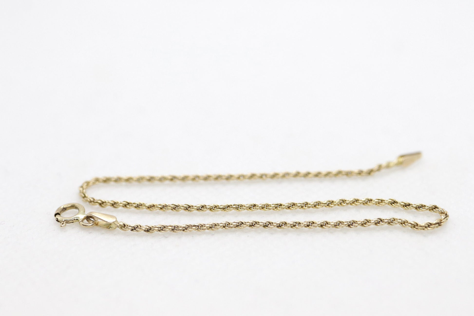 14k Gold Twisted Rope Bracelet 1.3mm 1.3 grams. Gold braided rope bracelet