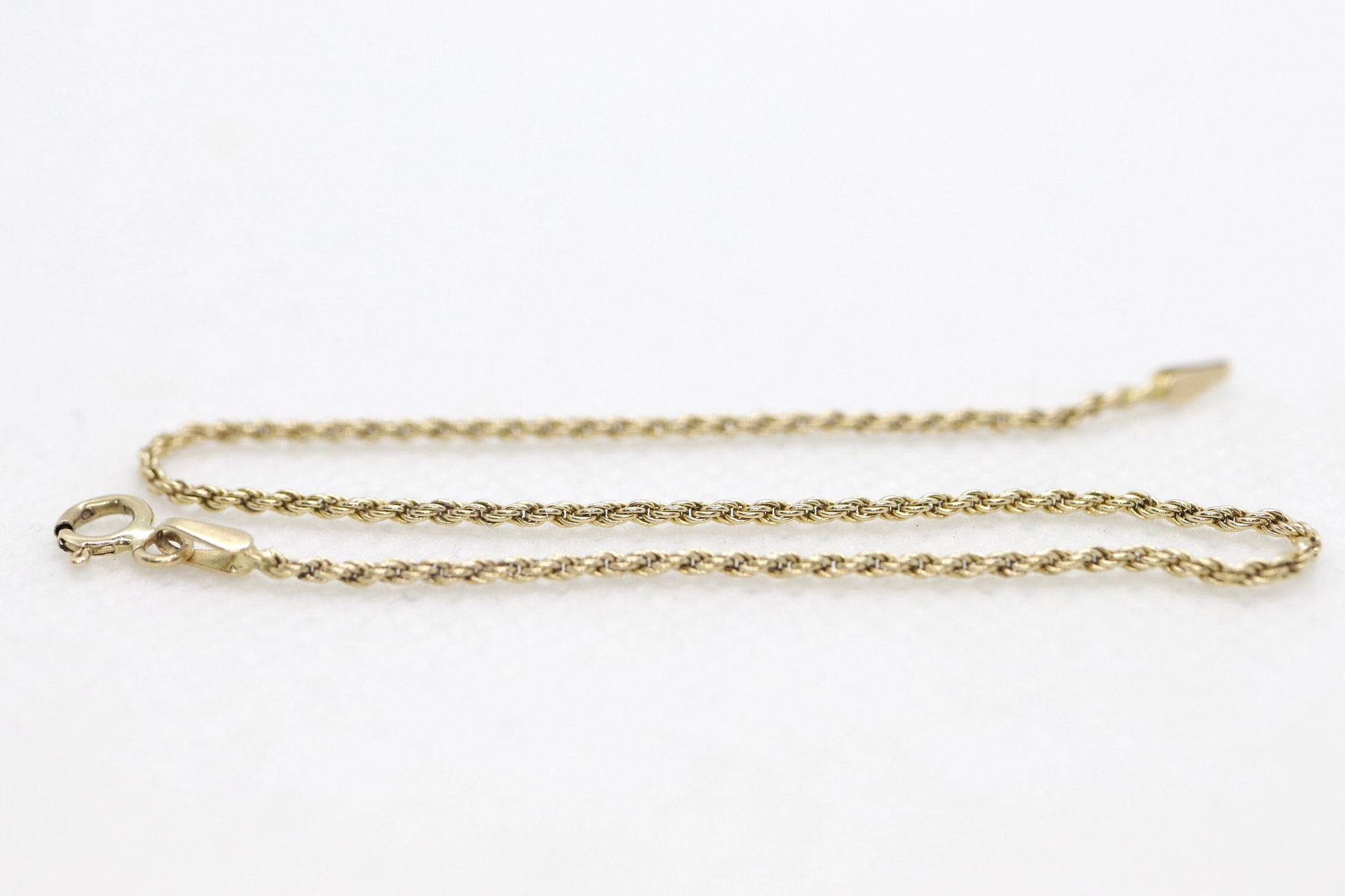 14k Gold Twisted Rope Bracelet 1.3mm 1.3 grams. Gold braided rope bracelet