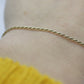14k Gold Twisted Rope Bracelet 1.3mm 1.3 grams. Gold braided rope bracelet
