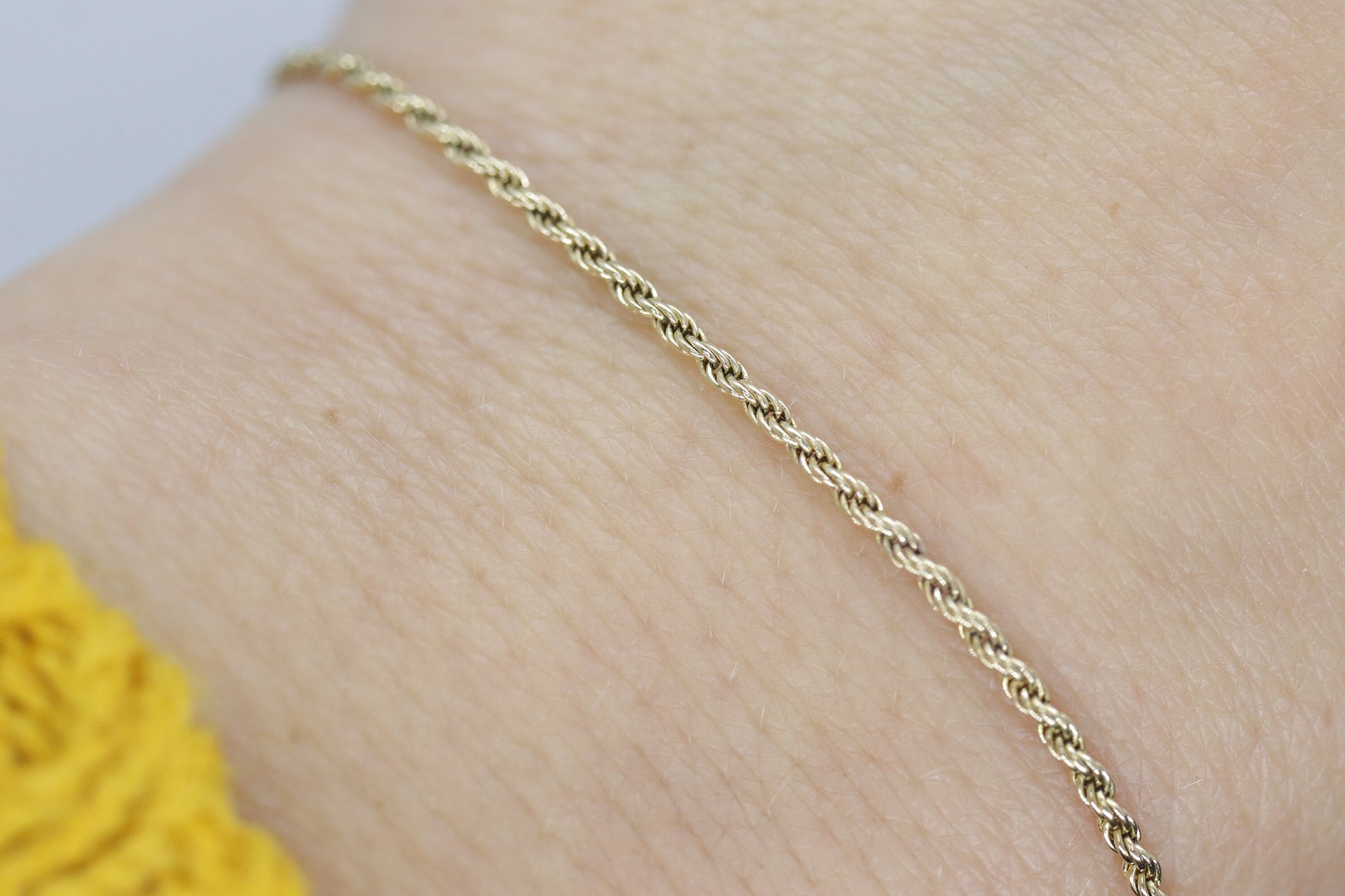 14k Gold Twisted Rope Bracelet 1.3mm 1.3 grams. Gold braided rope bracelet