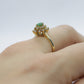 14k Emerald and Diamond Halo yellow gold ring. Emerald and Diamond Cluster ring. (15)(00.130)