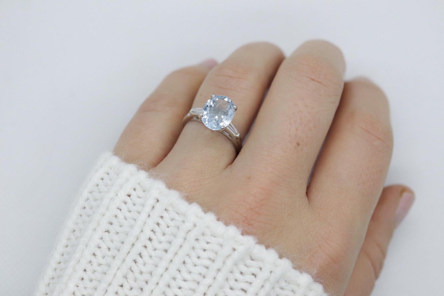 Platinum Large Aquamarine and Tapered Baguette diamond ring. Platinum oval aquamarine engagement ring st632/50