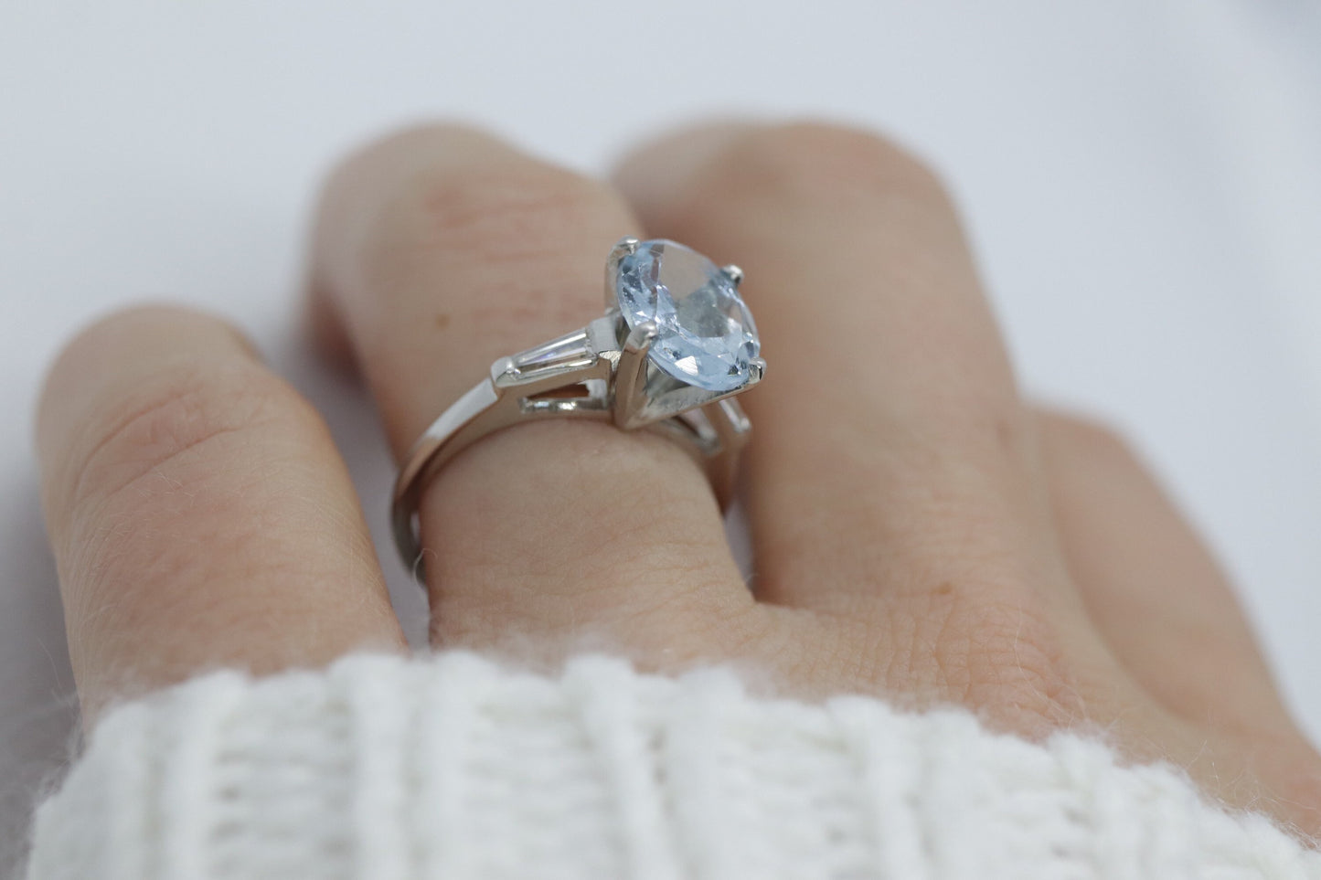 Platinum Large Aquamarine and Tapered Baguette diamond ring. Platinum oval aquamarine engagement ring st632/50