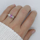 Oval Pink Sapphire Solitaire. 14k white gold with diamond melees st195