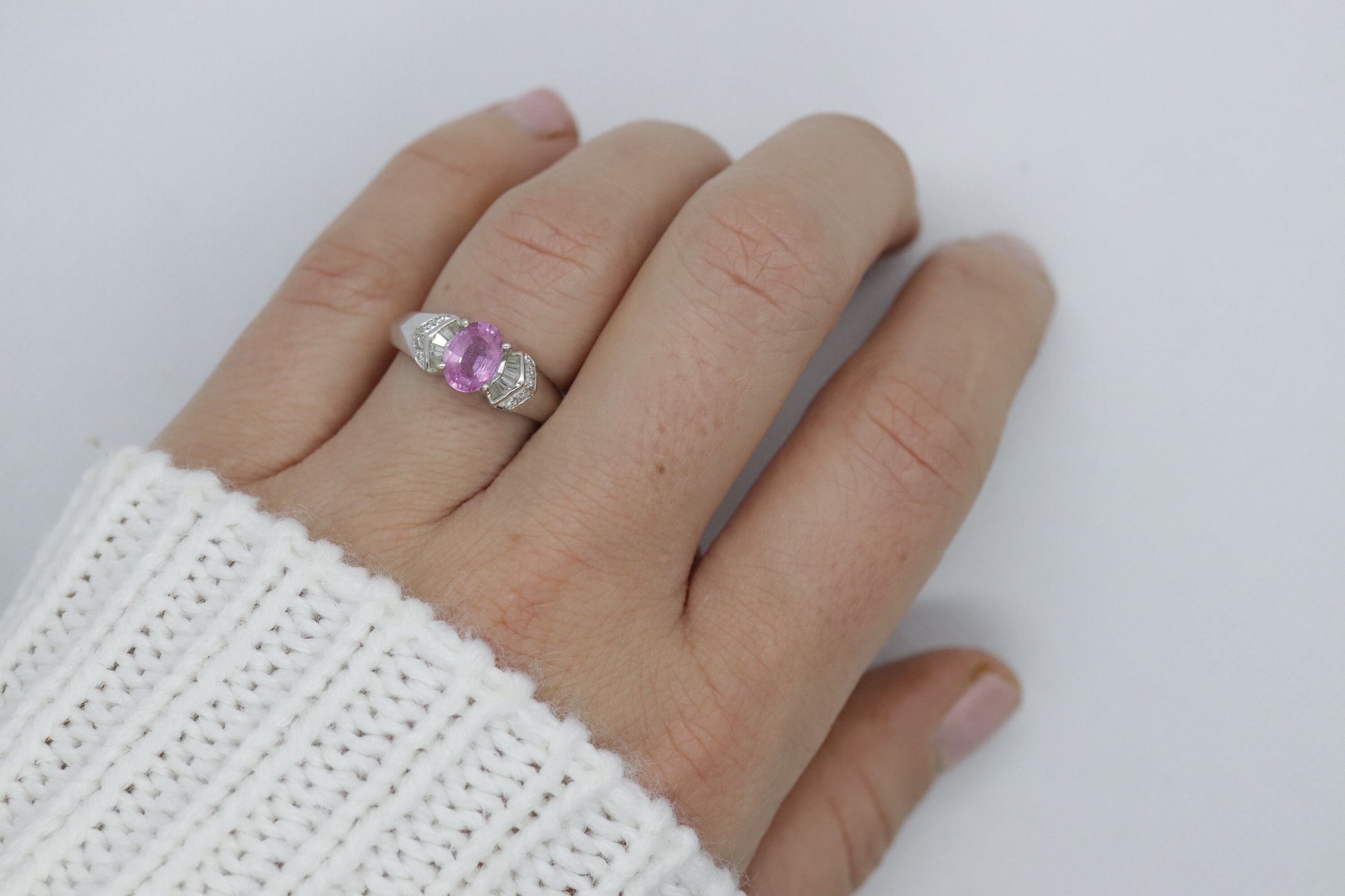 Oval Pink Sapphire Solitaire. 14k white gold with diamond melees st195