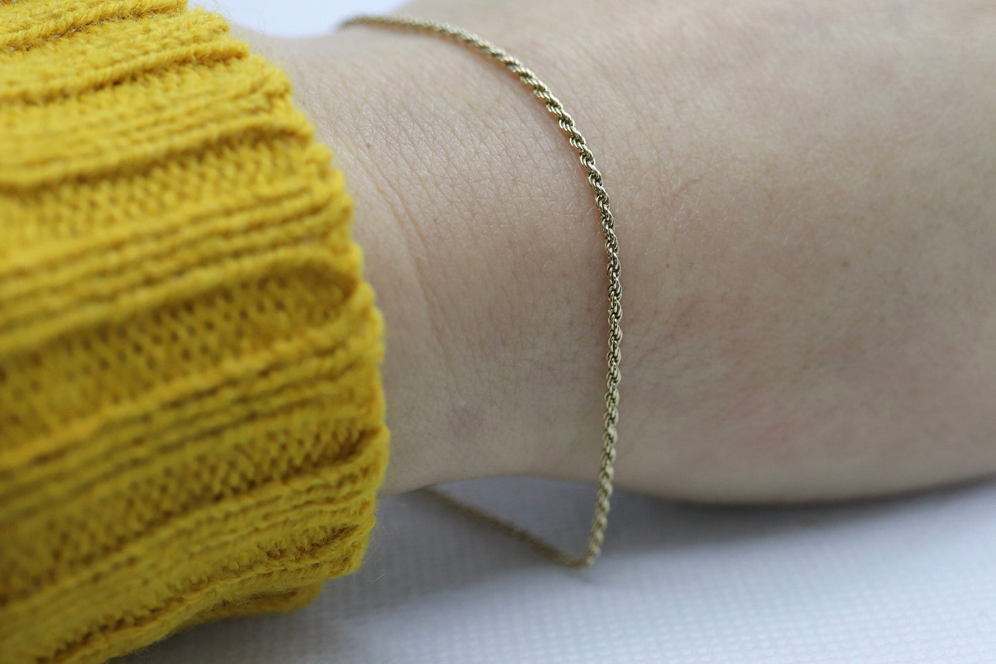 14k Gold Twisted Rope Bracelet 1.3mm 1.3 grams. Gold braided rope bracelet