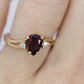 14k Pear Garnet and diamond ring. 14k Pear cut garnet with diamonds solitaire