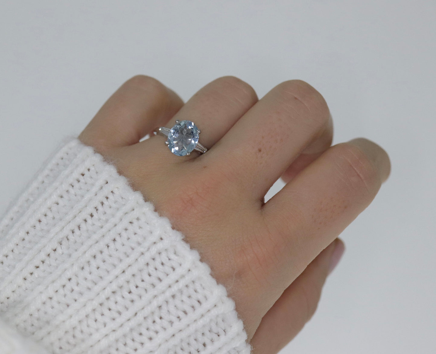 Platinum Large Aquamarine and Tapered Baguette diamond ring. Platinum oval aquamarine engagement ring st632/50