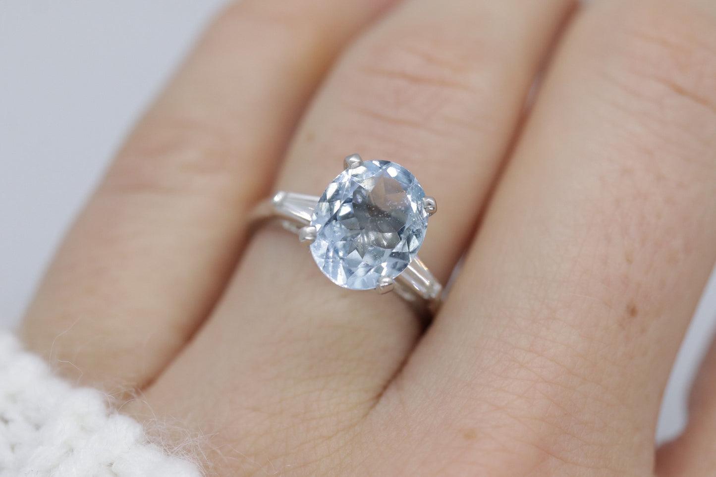 Platinum Large Aquamarine and Tapered Baguette diamond ring. Platinum oval aquamarine engagement ring st632/50