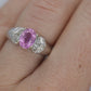Oval Pink Sapphire Solitaire. 14k white gold with diamond melees st195