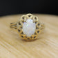14k Opal Solitaire Claw set ring. Opal solitaire band. st(69/11)