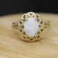14k Opal Solitaire Claw set ring. Opal solitaire band. st(69/11)