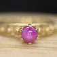 Linde RED PINK STAR Ruby Solitaire ring. 10k Yellow gold.