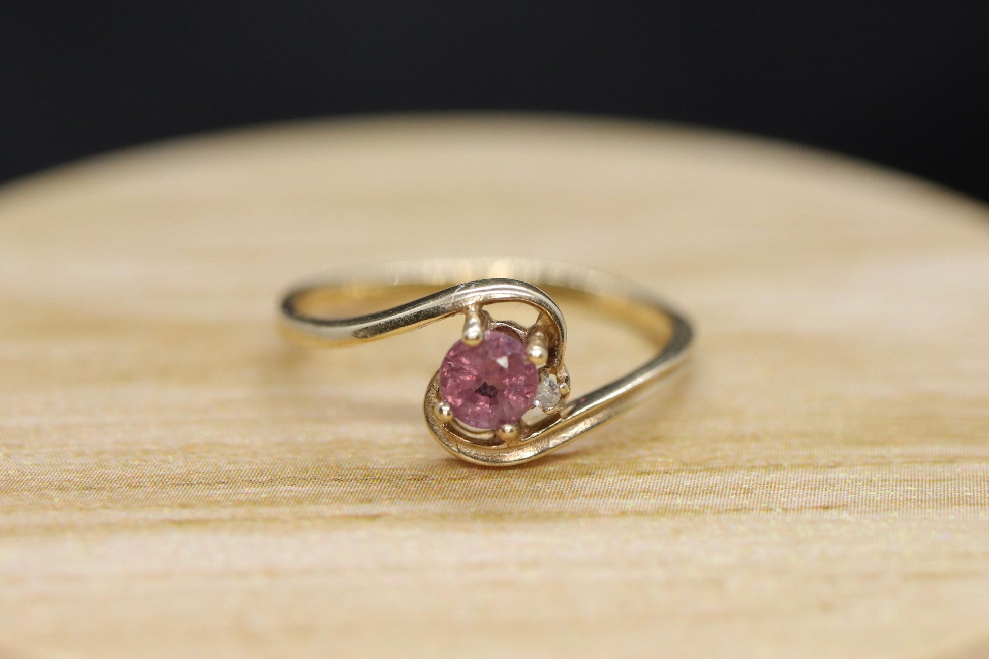 Dainty Ruby Ring. 10k round Ruby and Diamond Bypass ring