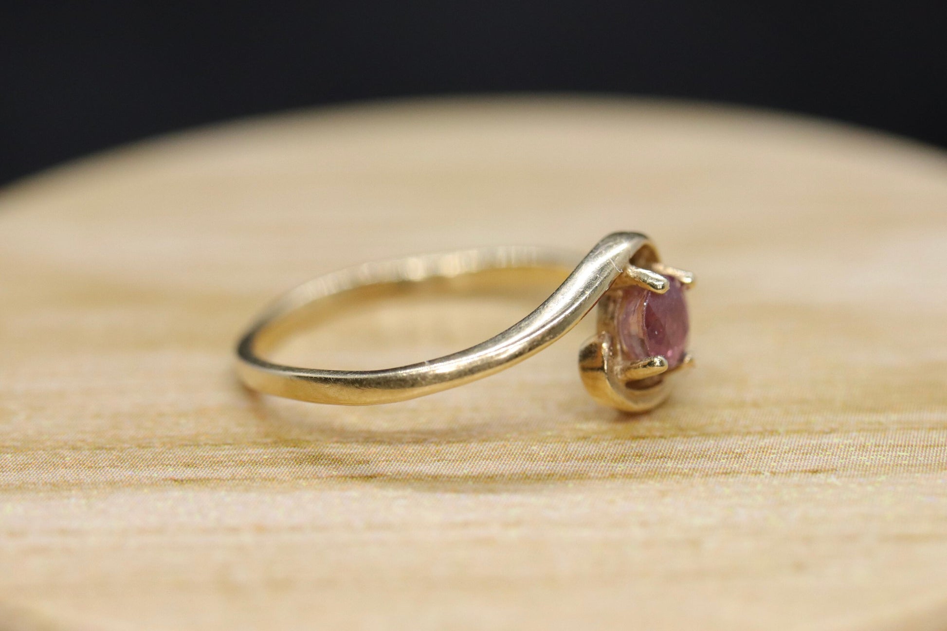 Dainty Ruby Ring. 10k round Ruby and Diamond Bypass ring