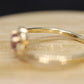 Dainty Ruby Ring. 10k round Ruby and Diamond Bypass ring